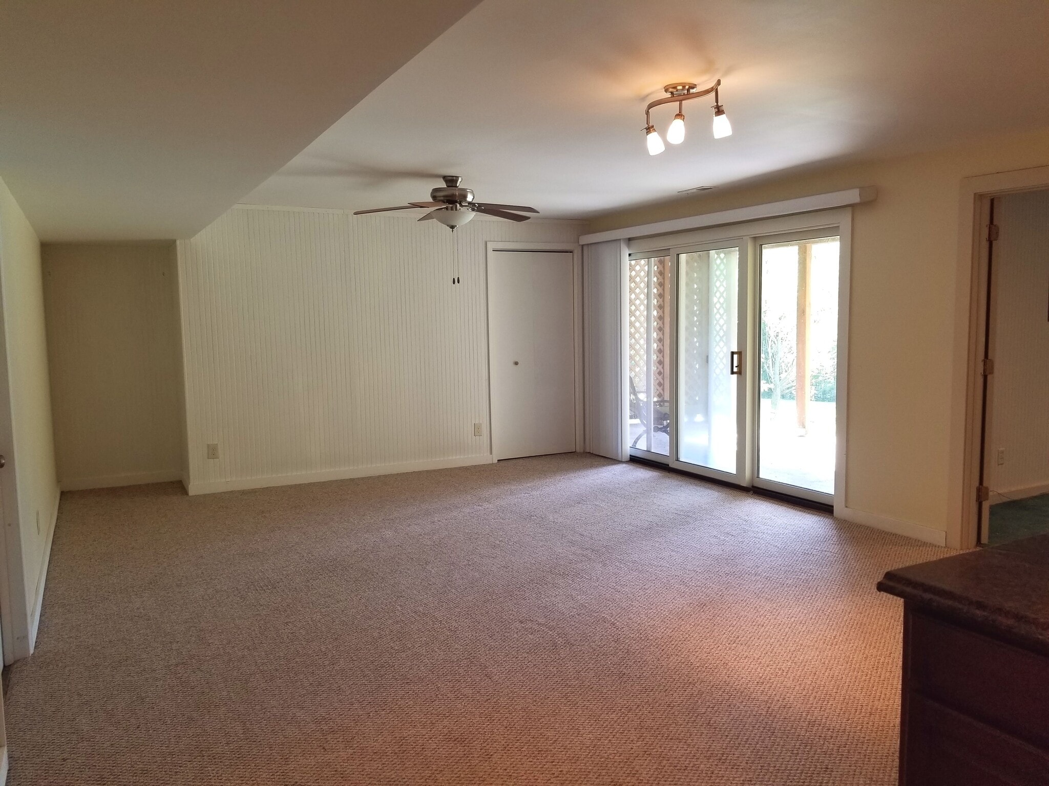 Basement Living Room - view from stairway landing - 3023 University Dr