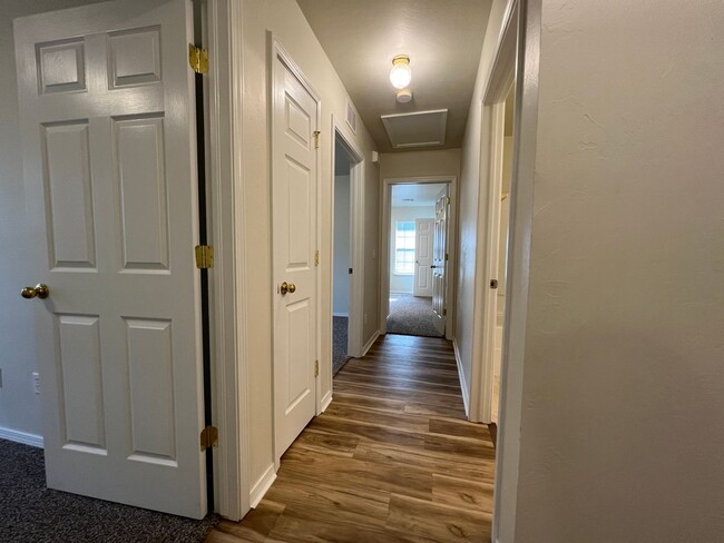 Building Photo - GEOTHERMAL Heat and Air! 3 Bedroom/2 Bathroom with attached 2 Car Garage