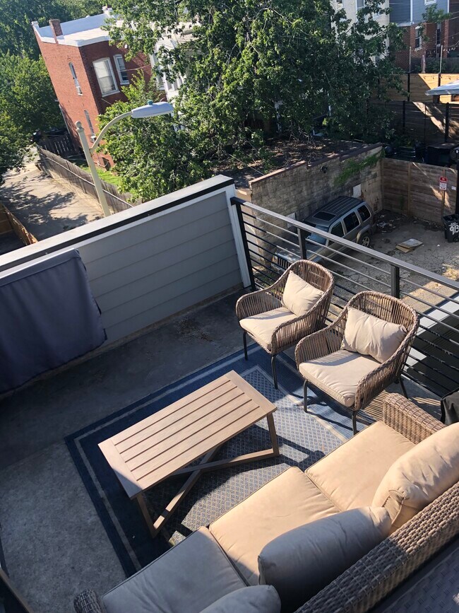 Primary bedroom #1 deck (outdoor tv and fridge; overlooking secured parking) - 614 I St NE