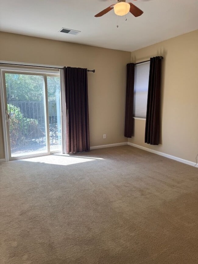 Building Photo - Located in a Quiet, Gated Community in Car...