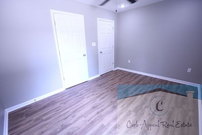 Building Photo - Move in special $650!! Luxury 2 bed, 1 bath duplex - new construction!! Washer and dryer and util...