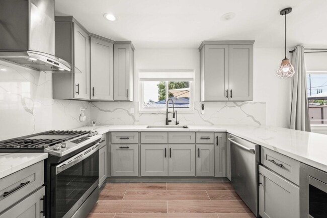 Building Photo - Stylishly Remodeled 4-Bedroom Home in Prim...