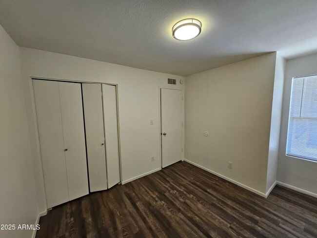 Building Photo - 1221 E Harmony Cir