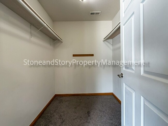 Building Photo - 2 bedroom 1.5 bath duplex with sunroom, 2 car garage and fenced yard