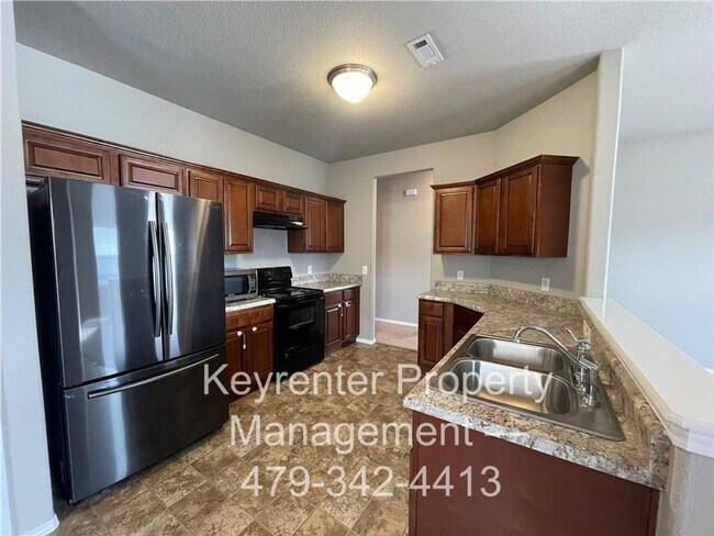 Building Photo - Spacious 3-Bedroom Springdale Home with Fenced Yard