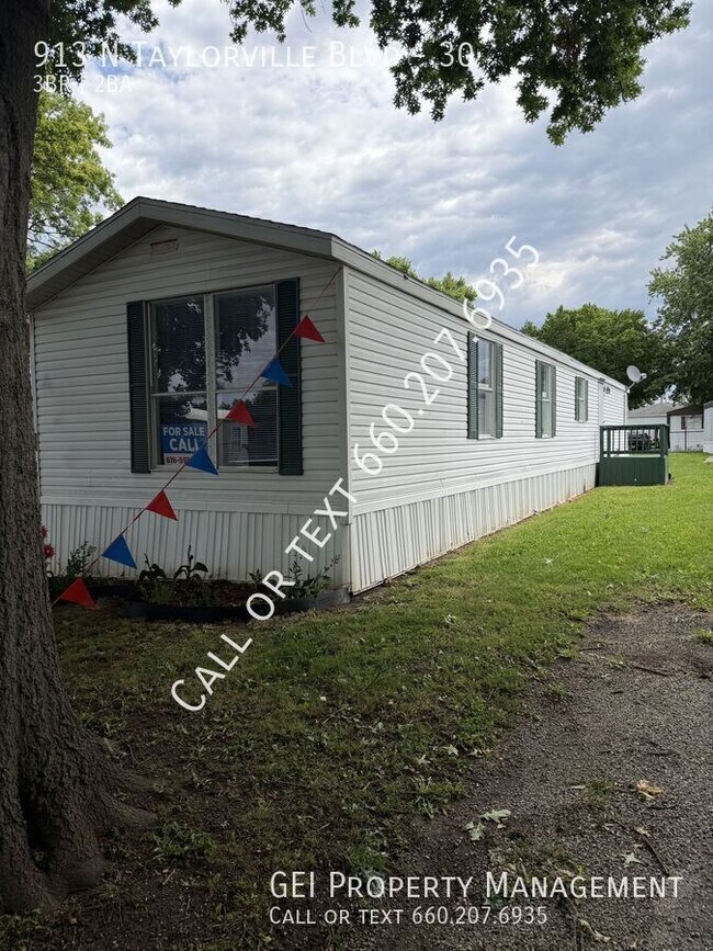 Building Photo - 913 N Taylorville Blvd