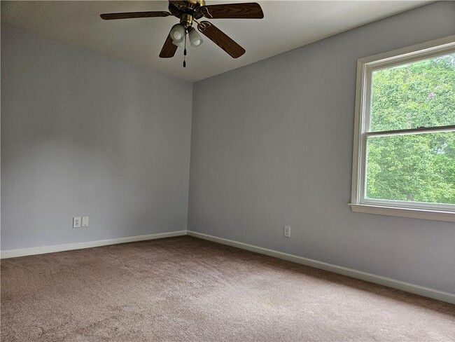 Building Photo - 1665 Windsong Park Dr NE