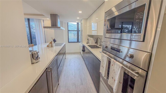 Building Photo - 9801 Collins Ave