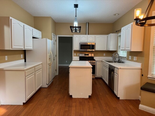 Building Photo - Fletcher - Four Bedroom, Lawn Care Included