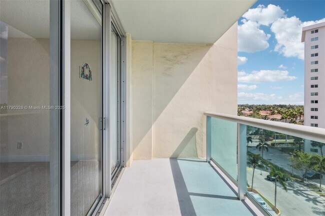 Building Photo - 19390 Collins Ave