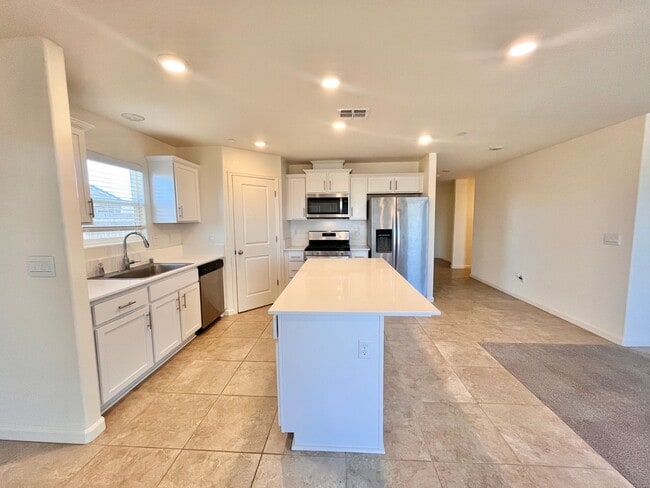 Building Photo - Spacious 4 Bedroom Home  – Solar & Pest Co...