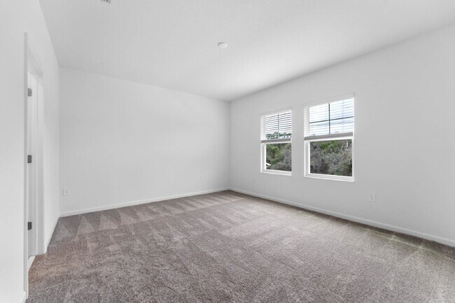 Building Photo - Modern Open-Concept Home with Designer Finishes and Community Amenities.