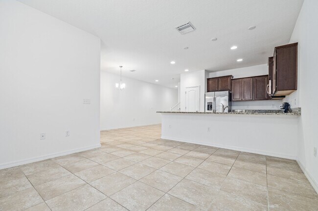 Building Photo - "Gated community in Seven Oak 3-Bedroom Townhouse with Granite Countertops in Wesley Chapel, FL"