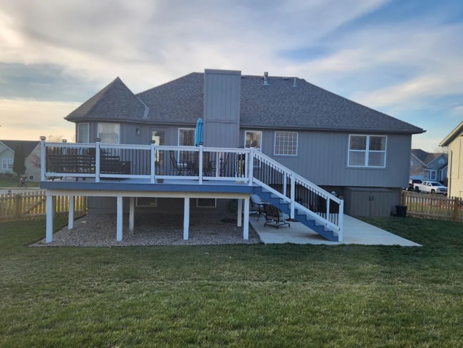 Large back deck with new fenced in yard. - 411 Bayview Dr
