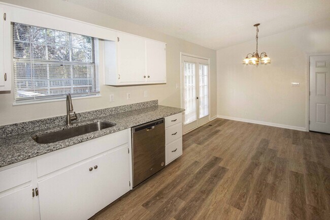 Building Photo - 6600 Woodcock Cir