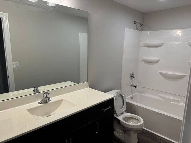 Building Photo - New Construction! West side location. 4br, 3bth, 2crg, Finished basement. All new stainless steel...