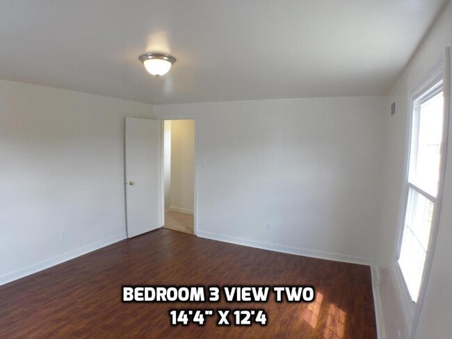 Building Photo - Three bedroom home excellent neighborhood