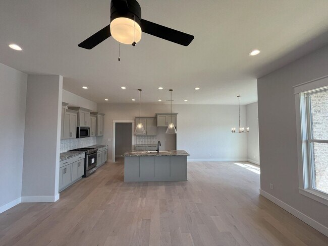 Building Photo - Nearly-new 4-bedroom, 2-bath home in the exclusive Lion's Gate Neighborhood!!!