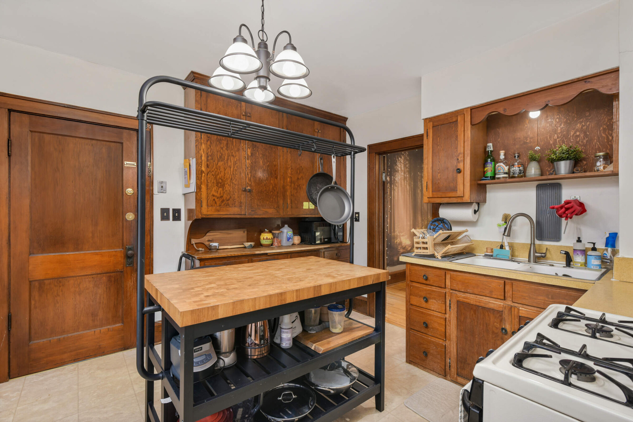 Kitchen has tons of storage in the floor to ceiling cabinets - 616 37th Ave NE