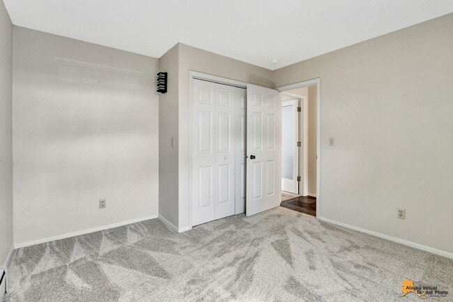 Building Photo - Spacious and bright condo located in a quiet area that boasts the perfect combination of style an...