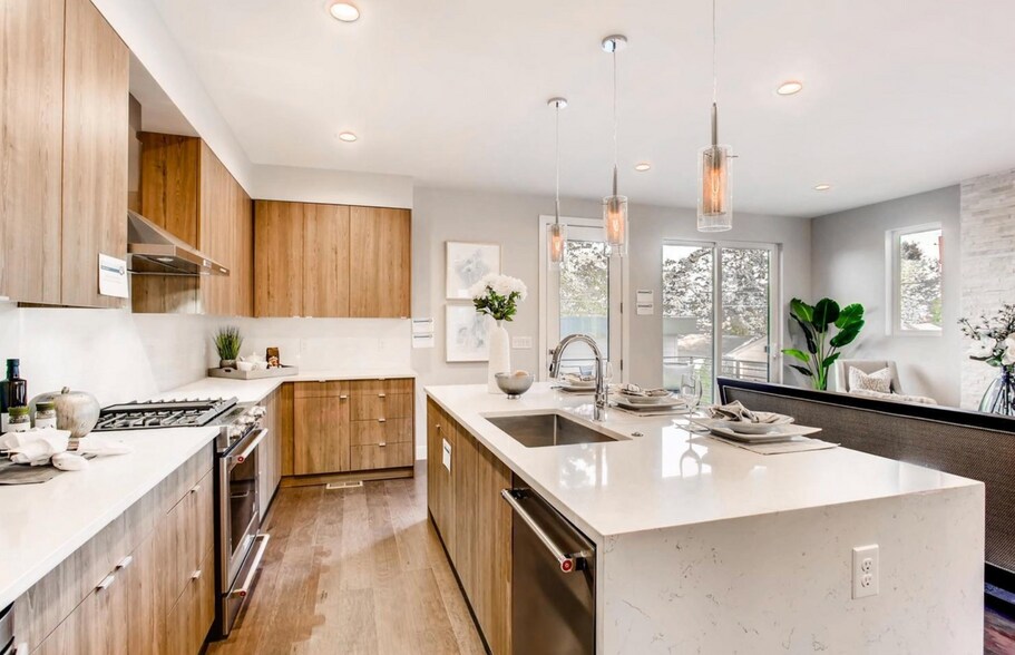 Kitchen and living area open on to main floor deck - 2765 S Sherman St