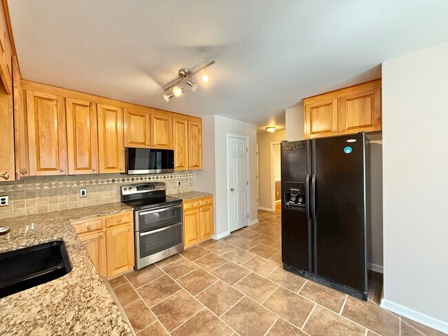 Building Photo - Charming 3BD, 2.5BA Willow Spring Home on a Corner Lot with a 2-Car Garage and a Large Fenced Bac...