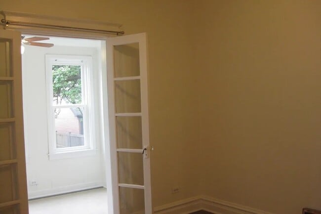 Primary bedroom french doors #2 - 4340 N Wolcott Ave