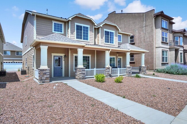 Building Photo - Modern Townhome with Central A/C, 2-Car Ga...