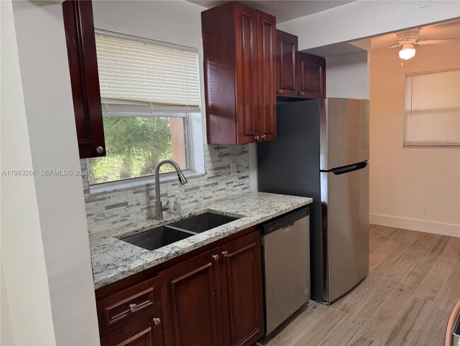 Building Photo - 2700 Coral Springs Dr