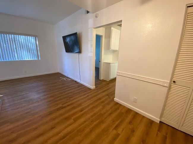 Building Photo - 2 BEDROOM DOWNSTAIRS END UNIT WITH PATIO