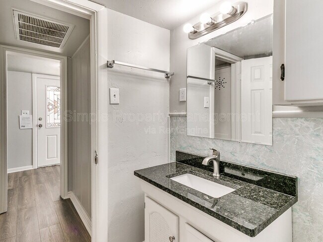 Building Photo - 9706 N Garnett Dr