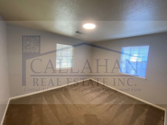 Building Photo - 8211 Woodview Dr N