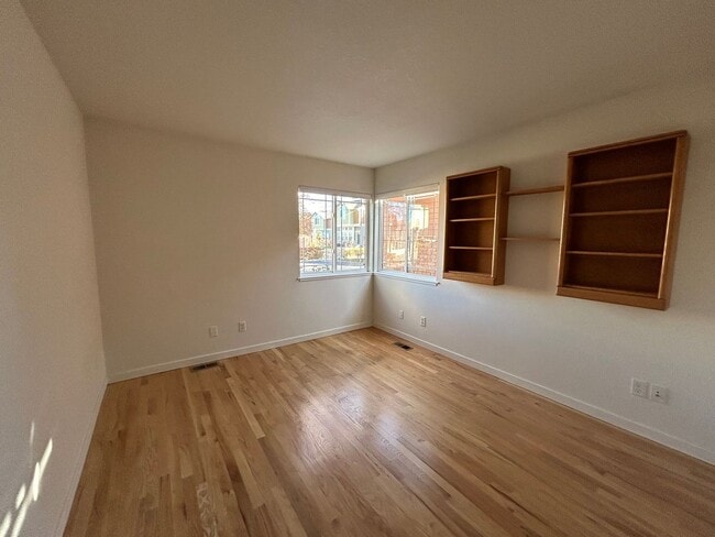 Building Photo - Stylish, Spacious 3 Bedroom Townhome with Two-Car Garage