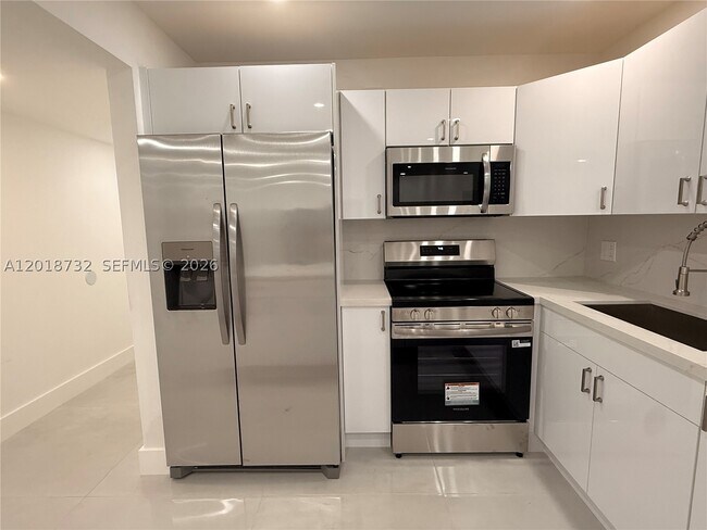 Building Photo - 6070 W 19th Ave