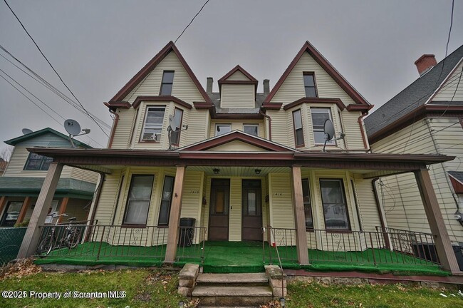 Building Photo - 1416 Capouse Ave