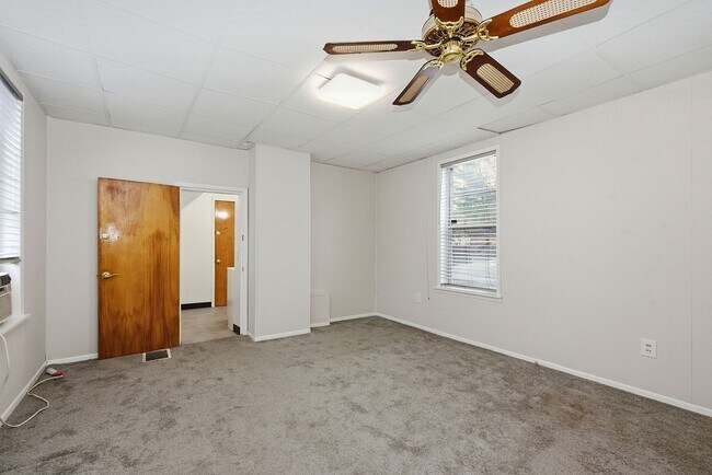 Building Photo - NORWOOD- Cute 2 bedroom 1.5 baths with fenced yard