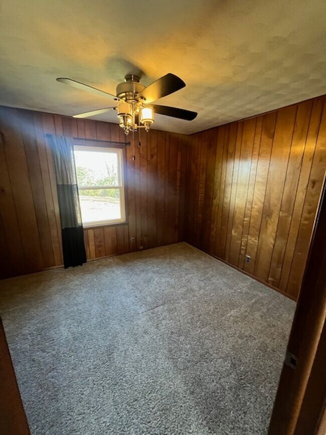 Building Photo - Spacious, Fully Updated Home with Walkout Basement on a Mature Lot