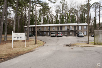 Building Photo - The Pines Apartments