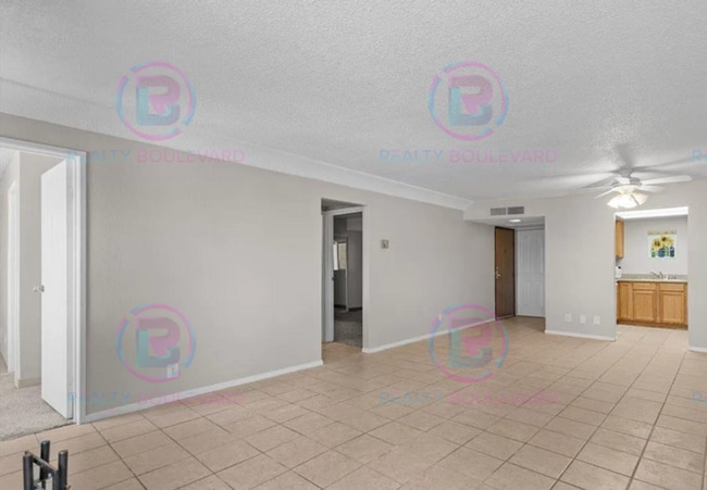 Building Photo - Incredible condo near UNR! This charming 2...