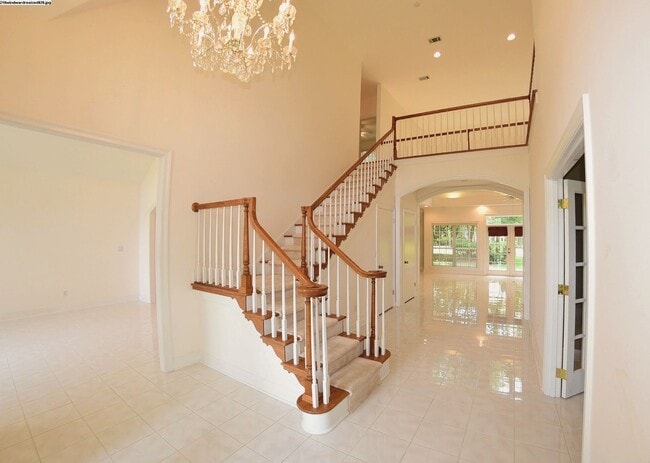 Building Photo - Executive Lakeview Home in Gated Windward Community!