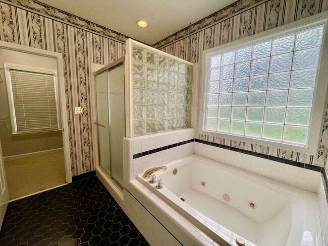 Building Photo - Spacious 3-Bedroom Nest with 2.5 Baths And...