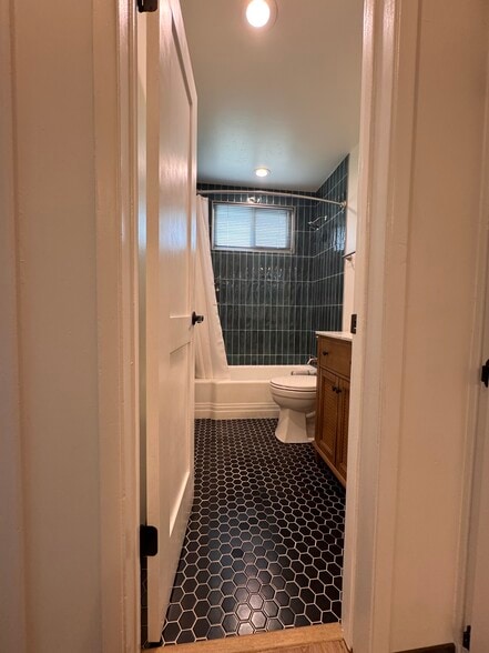 Hallway into bathroom - 1016 Western Ave