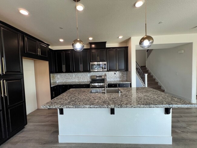 Building Photo - Beautiful 4 Bedroom Home With Low Maintenance Landscaping And Updated Interior