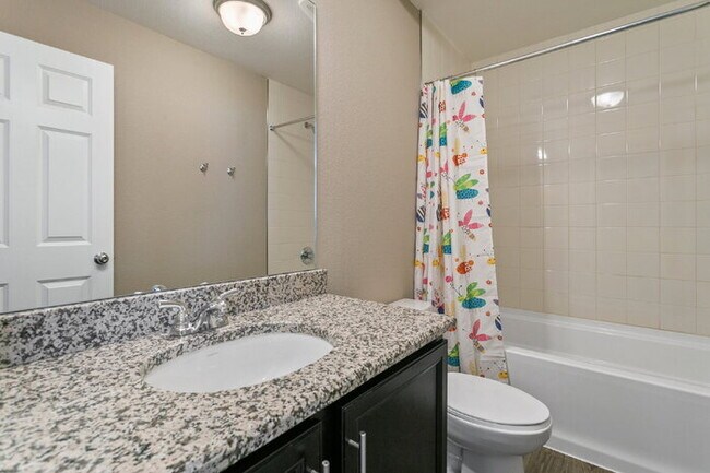 Building Photo - Spacious Banning Lewis Home with Finished ...
