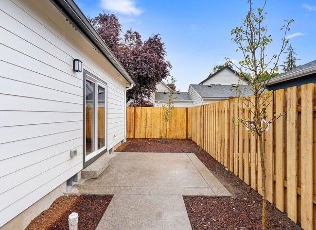 Building Photo - Brand-New Detached 2 Bedroom Home with Private Fenced Yard and Designer Finishes