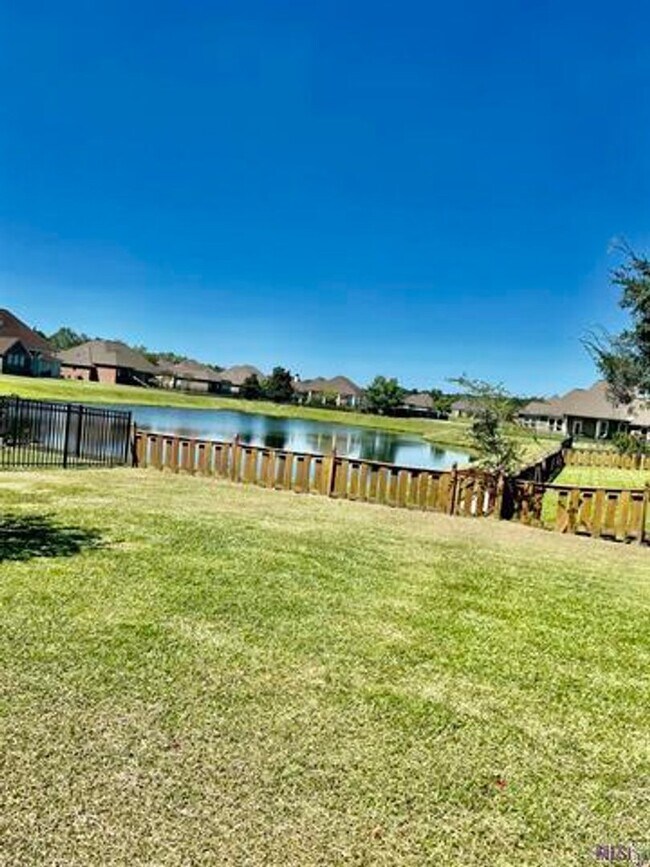 Building Photo - Beautifully Furnished 4-Bedroom Home in Zachary's Audubon Lakes!