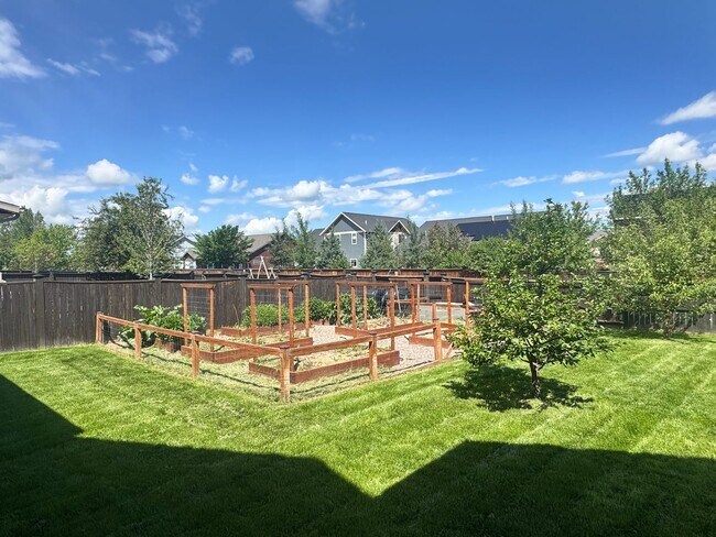 Building Photo - Large, Open Home with Beautiful Backyard and Oversized Garage