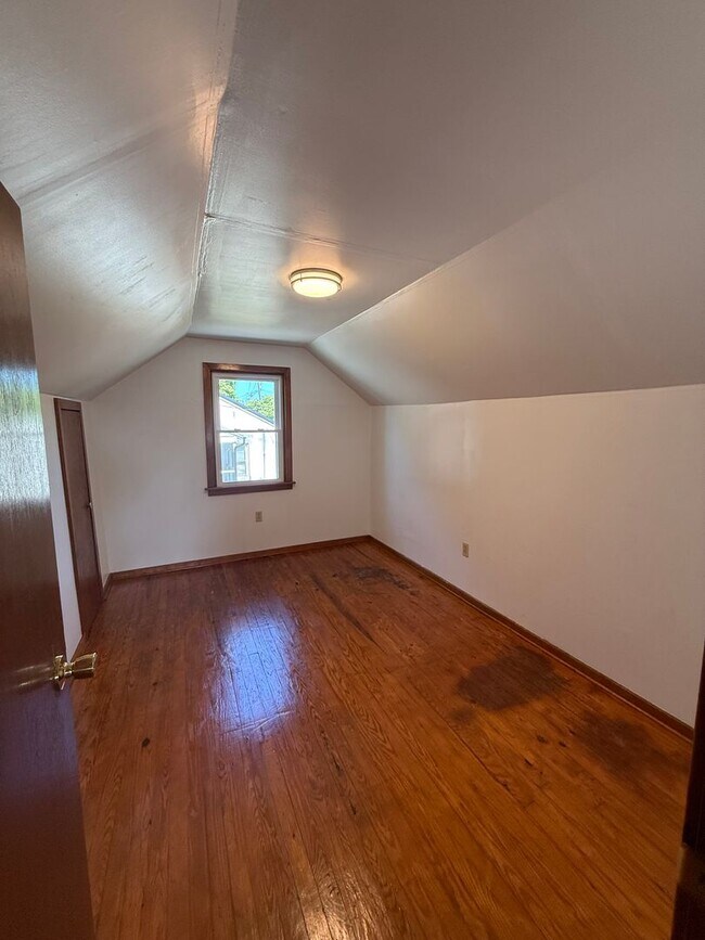 Building Photo - Charming 4-Bedroom Cape Cod Home with Spacious Yard & Storage