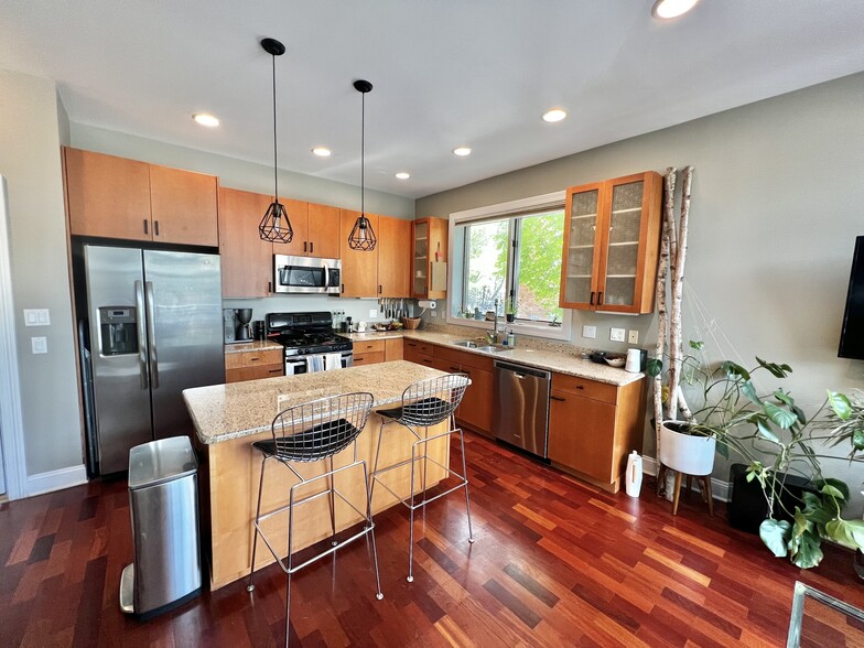 Modern kitchen with new appliances - 1700 N Talman Ave
