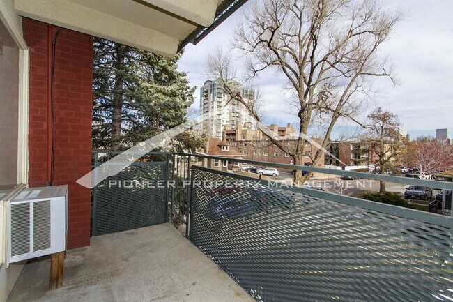 Building Photo - Cozy Condo with Assigned Parking Spot and Balcony